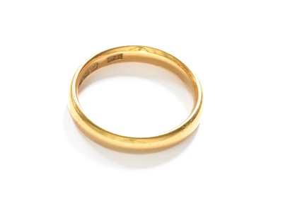 Lot 392 - A 22 Carat Gold Band Ring, finger size M1/2