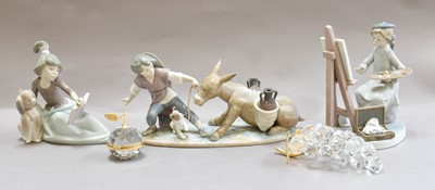 Lot 51 - Three Lladro figures, together with two boxed...