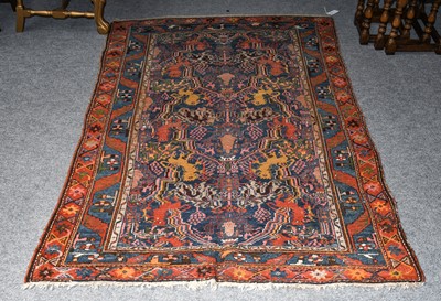 Lot 1198 - Hamadan Rug, the indigo field of mythical...