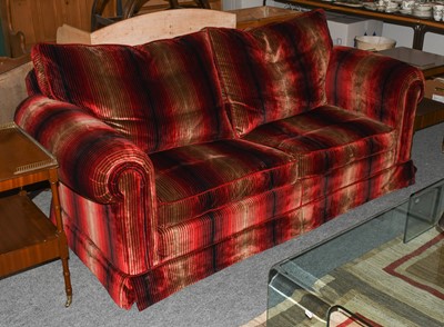 Lot 1231 - A Duresta two seater sofa in black and red...