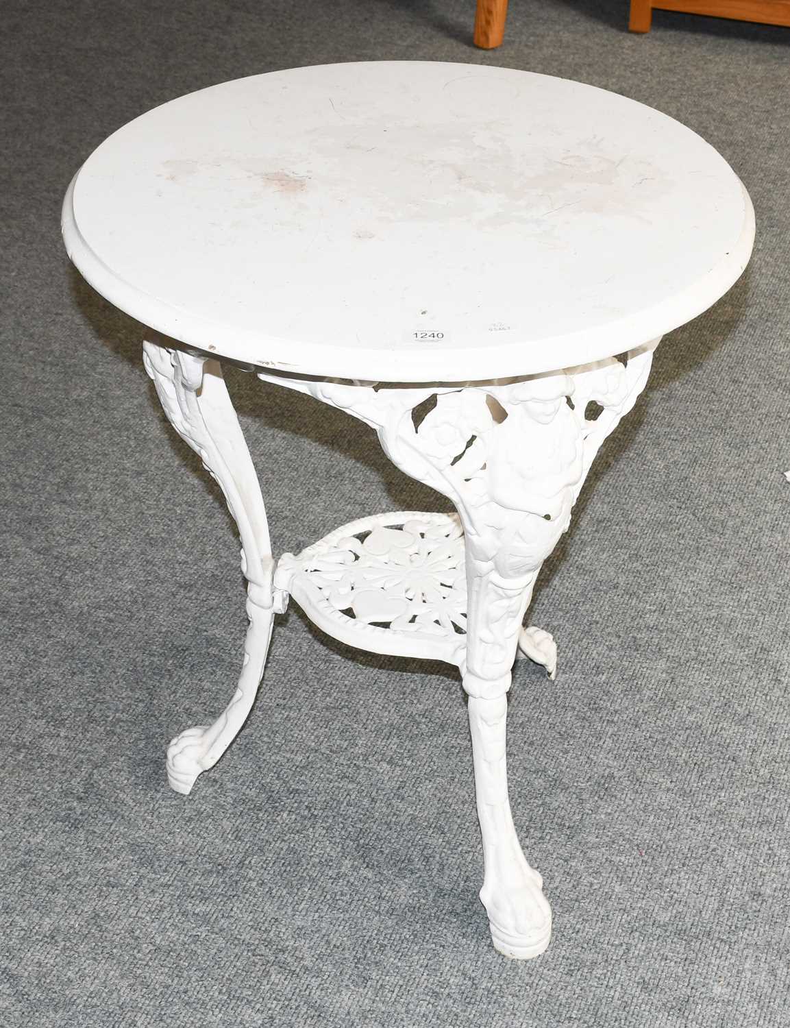 Lot 1240 A Victorian painted cast iron pub table,