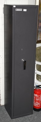 Lot 1253 - A grey painted steel gun cabinet, safe guard...