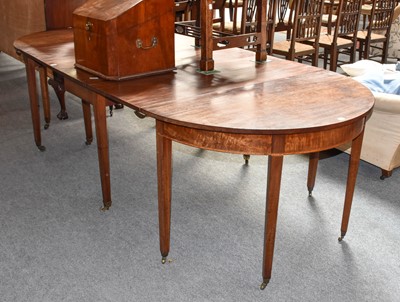 Lot 1095 - A Regency mahogany D end dining table with...