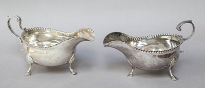 Lot 208 - Two George III Provincial Silver Sauceboats,...