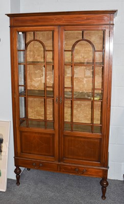 Lot 1071 - An Edwardian inlaid mahogany display cabinet,...