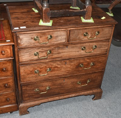 Lot 1151 - A George III mahogany chest of two short over...