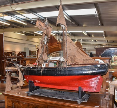 Lot 330 - A large painted model of a twin masted fishing...