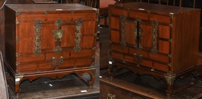 Lot 1140 - A pair of 20th century Chinese table cabinets...