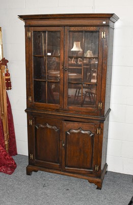 Lot 1310 - A Titchmarsh & Goodwin style oak bookcase with...