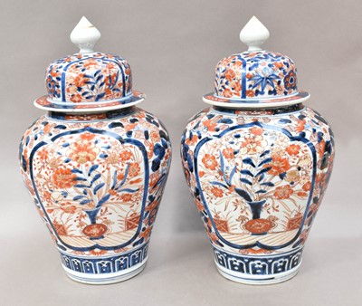 Lot 299 - A pair of Japanese Meiji period Imari baluster...