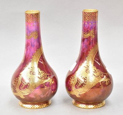 Lot 141 - A pair of Wedgwood Dragon lustre vases...