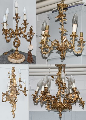 Lot 1187 - An ormolu six branch chandelier of scrolling...