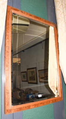 Lot 1228 - A rectangular hanging mirror in a pollard oak...