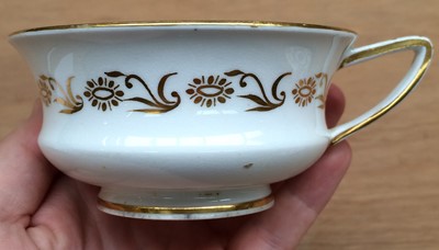 Lot 248 - A Coalport Felt Spar Cup and Saucer, pattern...