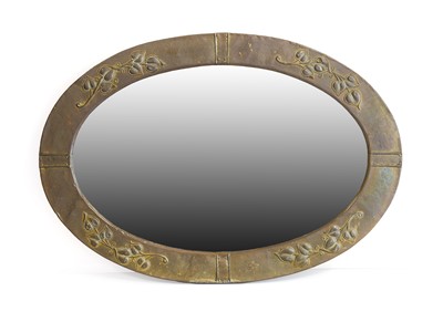 Lot 1082 - An Arts & Crafts Oval Patinated Metal Mirror,...