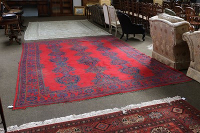 Lot 1117 - An Ushak Carpet, the tomato red field with...