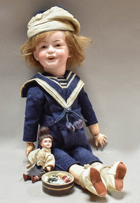 Lot 226 - An SFB J 229 Sailor Doll, (crack to head) and...
