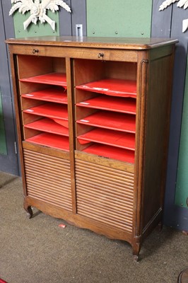 Lot 1202 - A 1920s Oak Tambour Fronted Stationary Cabinet,...