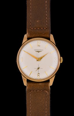 Lot 2248 - Longines: A 9 Carat Gold Wristwatch, signed...