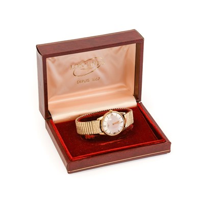 Lot 2177 - Longines: A 9 Carat Gold Wristwatch, signed...