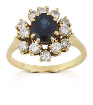 Lot 2237 - A Sapphire and Diamond Cluster Ring