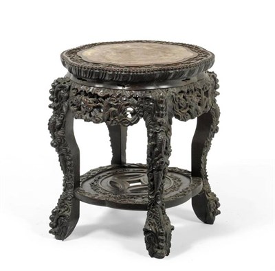 Lot 1256 - A Chinese Carved Padouk Wood and Pink Marble Plant Stand, early 20th century, with foliate and...