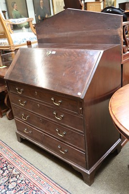 Lot 1213 - A George III Mahogany Bureau, fitted interior...