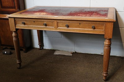 Lot 1336 - A Victorian Oak Writing Table, with reeded...