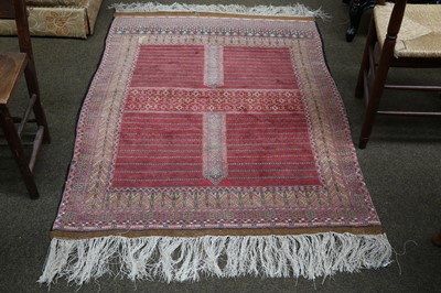 Lot 1111 - An Afghan Hatchlu, the claret quartered field...