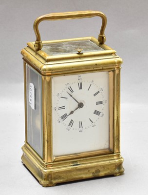 Lot 220 - A Brass Strike and Repeat Carriage Clock,...