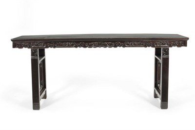 Lot 1261 - A Chinese Hardwood Altar Table, late 19th/early 20th century, with decorative carved apron, the...