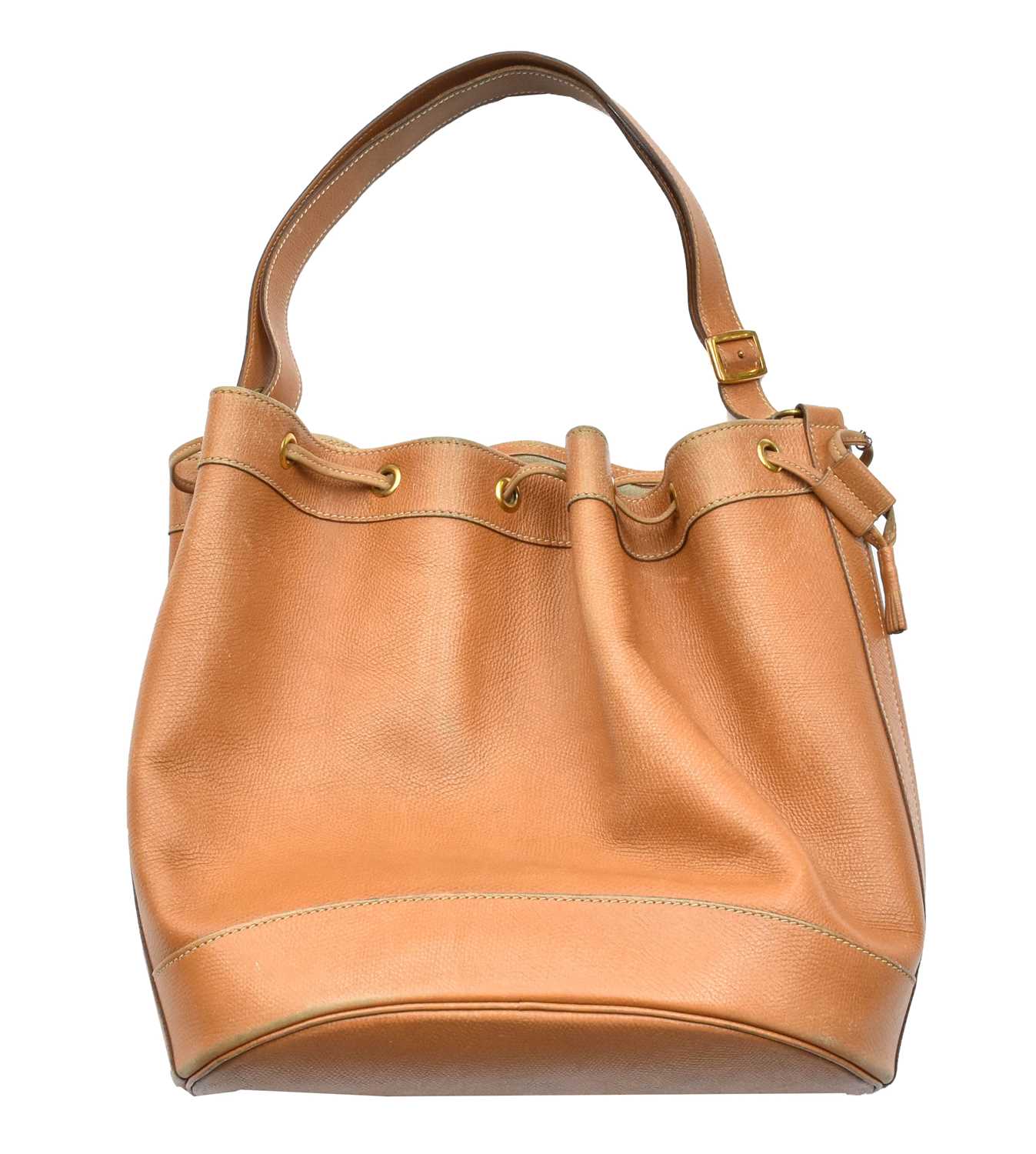 Lot 1089 - A Hermès Tan Leather Drawstring Bucket Bag,...