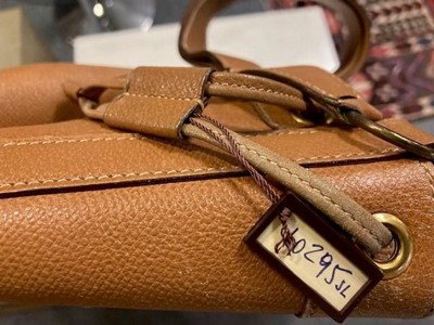 Lot 1089 - A Hermès Tan Leather Drawstring Bucket Bag,...