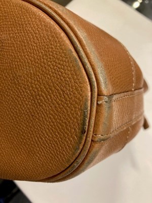 Lot 1089 - A Hermès Tan Leather Drawstring Bucket Bag,...