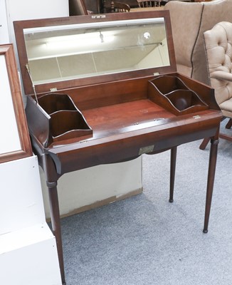 Lot 1147 - A Modern Walnut Dressing Table, with hinged...