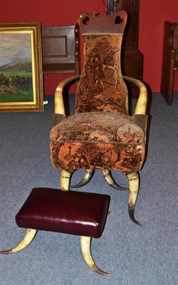 Lot 1264 - An Early 20th Century Cow Horn Armchair, of eight shaped horns and covered in brown velvet...