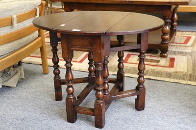 Lot 1198 - A Solid Oak Small Gateleg Table, makers Siesta,...