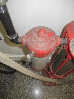 Lot 139 - A Vintage Red Painted Skeleton Petrol Pump,...