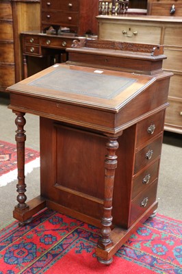 Lot 1302 - A Victorian Mahogany Davenport, with leather...