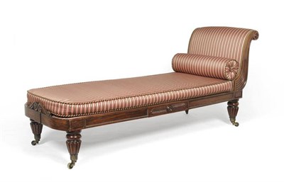 Lot 1265 - A William IV Rosewood Simulated Chaise Longue, 2nd quarter 19th century, upholstered in striped...