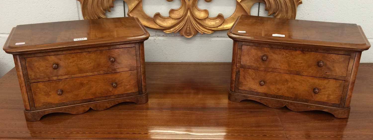 Lot 1134 - A Pair of Figured Walnut Miniature Two Drawer...