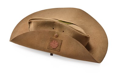 Lot 2225 - A Second World War Slouch Hat, in khaki felt,...