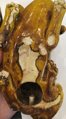 Lot 308 - A Chinese Yellow-Glazed Porcelain Figure of a...