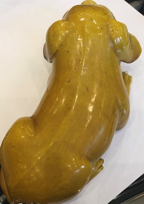 Lot 308 - A Chinese Yellow-Glazed Porcelain Figure of a...