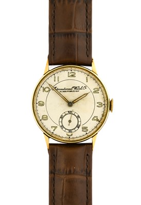 Lot 2171 - IWC: A 14 Carat Gold Wristwatch, signed...