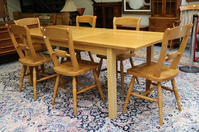 Lot 1144 - A Modern Stag Light Oak Extending Dining Table,...