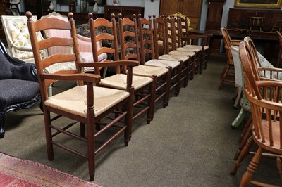 Lot 1275 - A Set of Eight Oak Ladder Back Kitchen Chairs,...