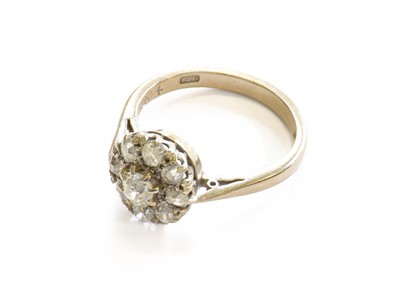 Lot 211 - An 18 Carat White Gold Diamond Cluster Ring,...