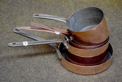 Lot 1317 - Five Graduated Copper pans, 19th century,...