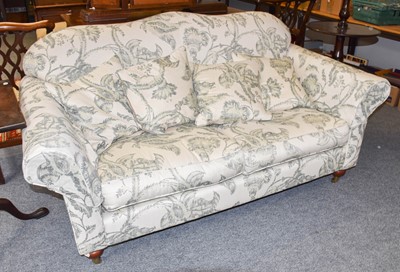 Lot 1268 - A Wesley-Barrell Two Seater Sofa, in leaf...